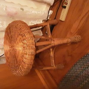 Wicker plant stand.